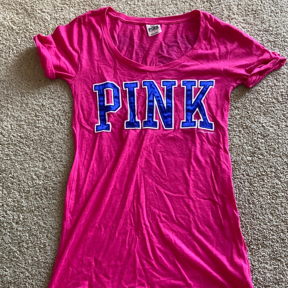 PINK Tshirt. “PINK” writing across front of T-Shirt.